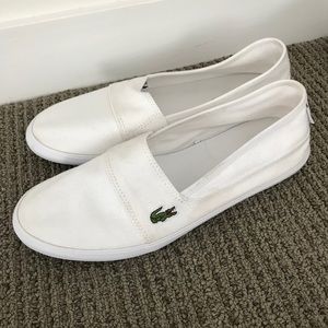 Women's white Lacoste slip on shoes